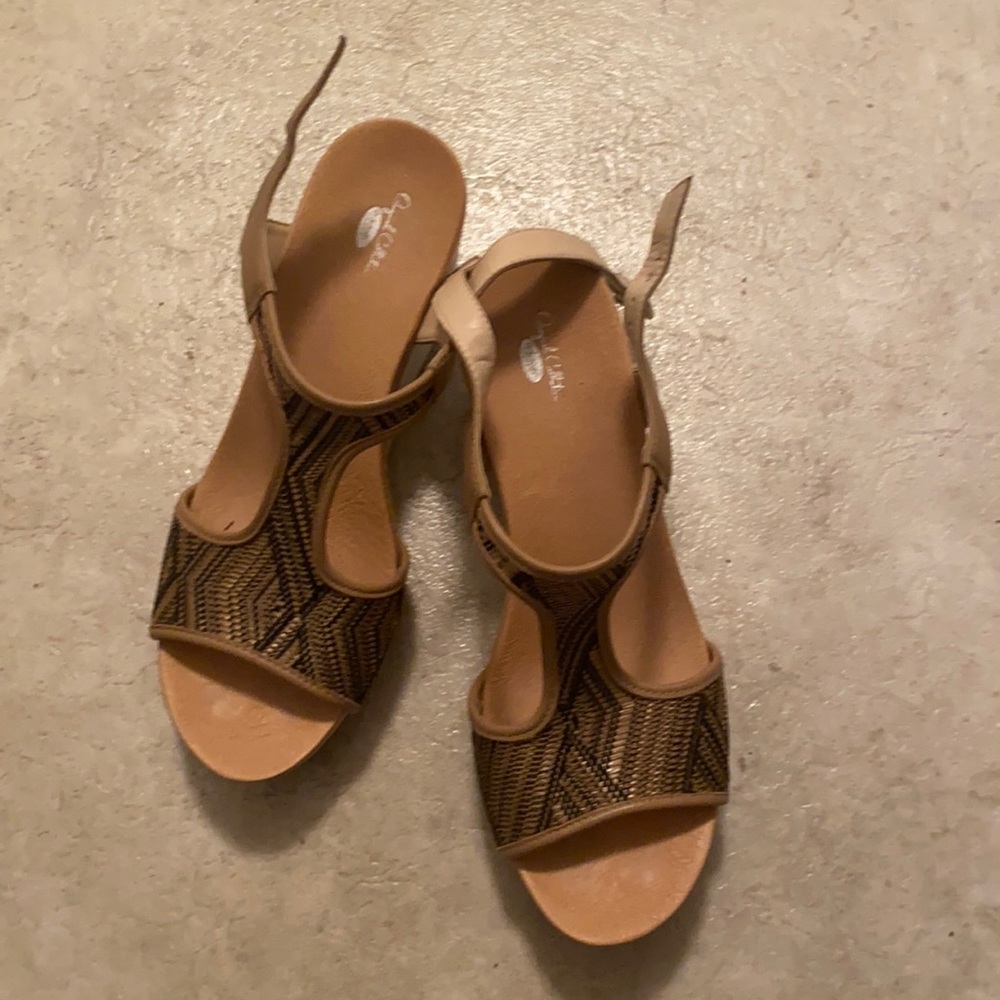 Dr. School’s black, gold, and tan wedges